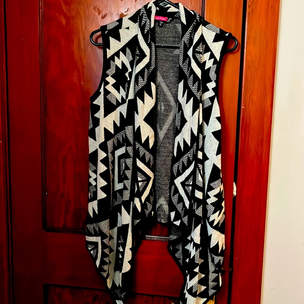 Small black and gray sleeveless sweater vest like cardigan